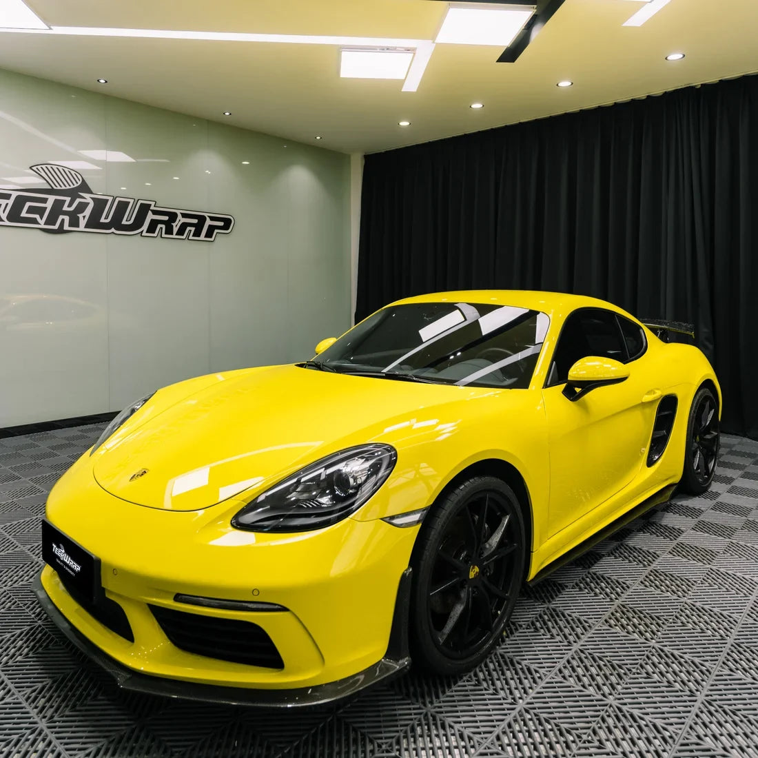 High Gloss Louvre Yellow Vinyl Wrap on Porsche Side Angle View