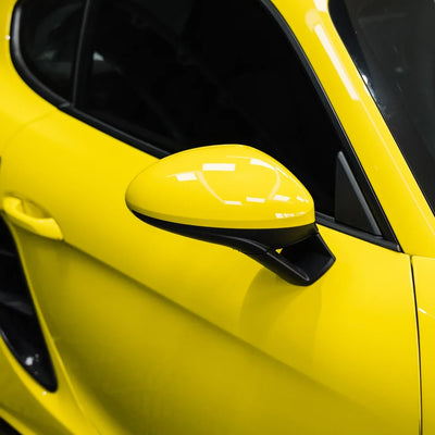 High Gloss Louvre Yellow Vinyl Wrap on Porsche Side Close-Up
