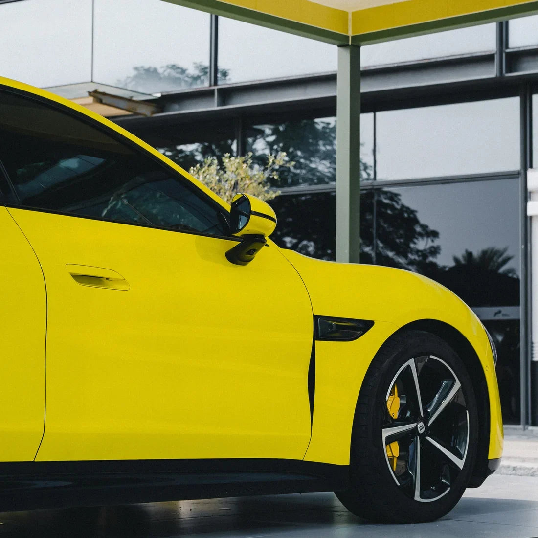 High Gloss Louvre Yellow Vinyl Wrap on Xiaomi Side Angle View