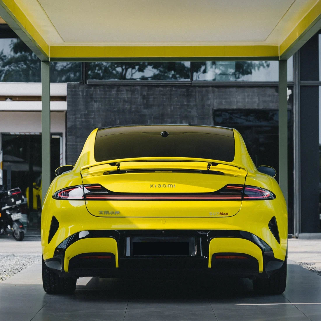 High Gloss Louvre Yellow Vinyl Wrap on Xiaomi Rear Angle View