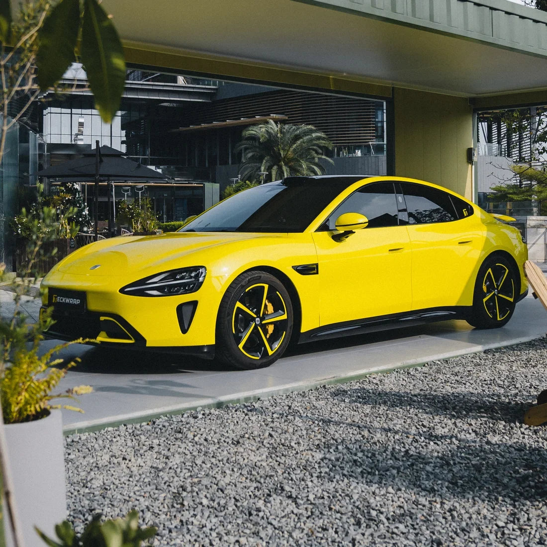 High Gloss Louvre Yellow Vinyl Wrap on Xiaomi Side Angle View