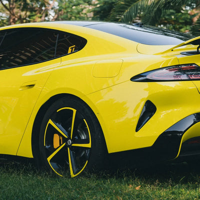 High Gloss Louvre Yellow Vinyl Wrap on Xiaomi Side Angle View