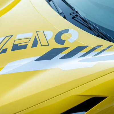 High Gloss Sunray Yellow Vinyl Wrap on Ferrari Rear Angle View