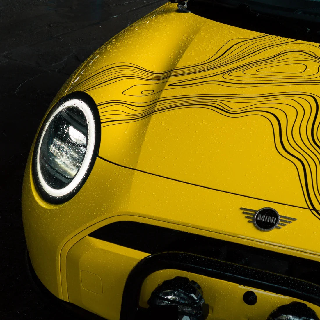 High Gloss Sunray Yellow Vinyl Wrap on Mini Cooper Wheel Close-Up