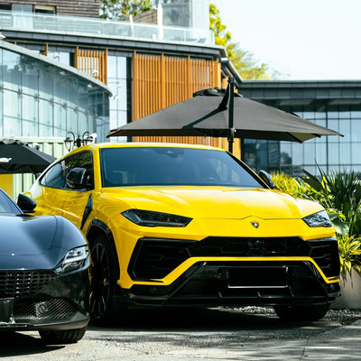 High Gloss Sunray Yellow Vinyl Wrap on Lamborghini Urus Front Angle