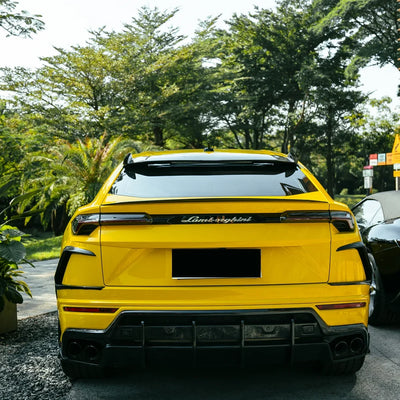 High Gloss Sunray Yellow Vinyl Wrap on Lamborghini Urus Rear Angle