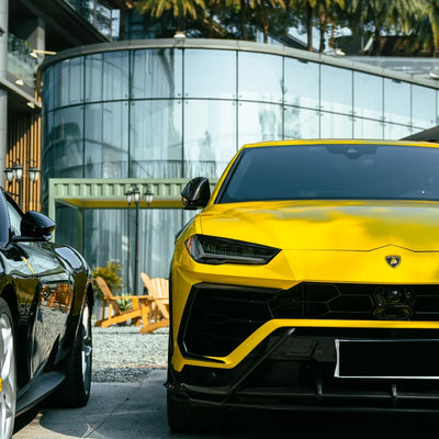 High Gloss Sunray Yellow Vinyl Wrap on Lamborghini Urus Front View