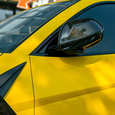 High Gloss Sunray Yellow Vinyl Wrap on Lamborghini Urus Hood Close-Up