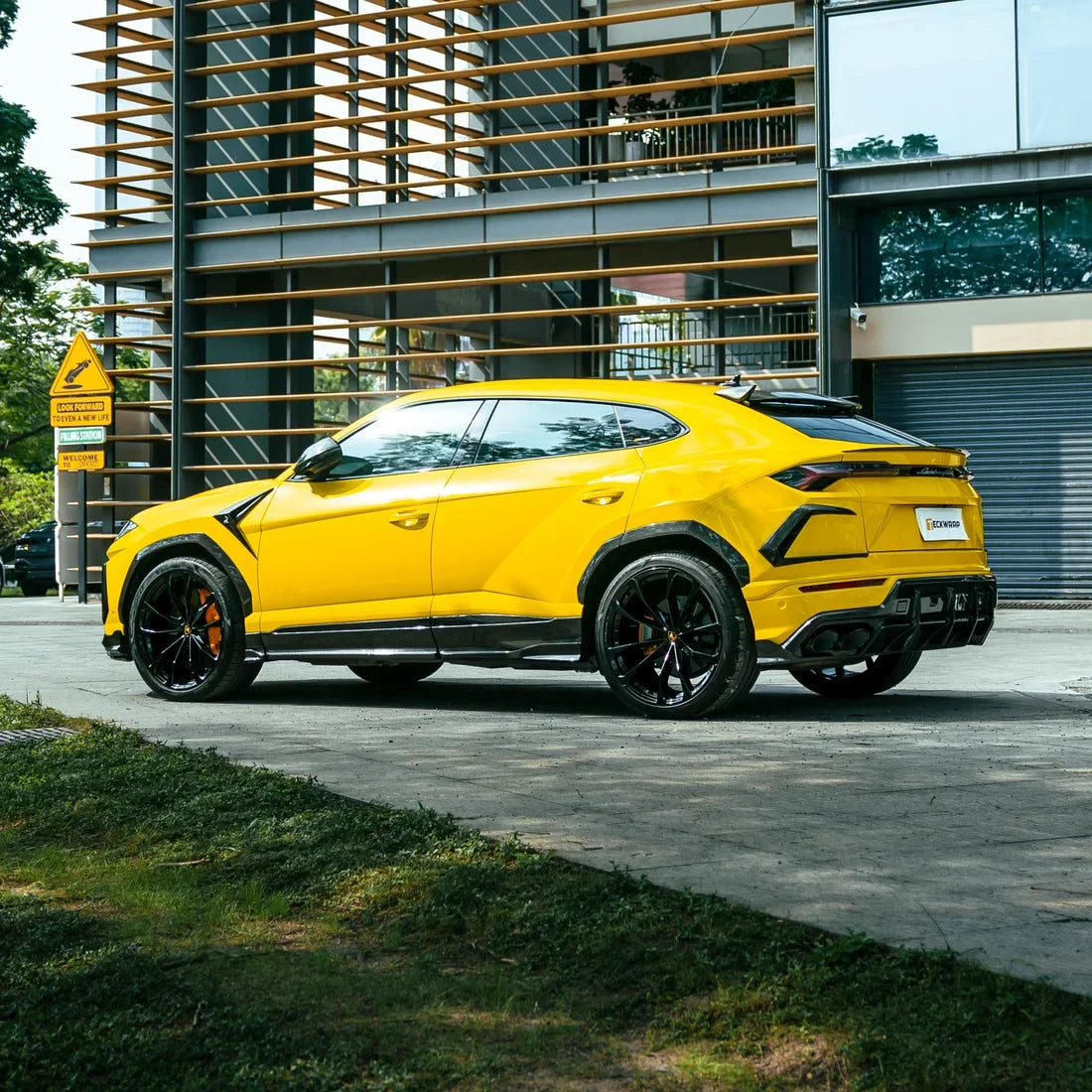 High Gloss Sunray Yellow Vinyl Wrap on Lamborghini Urus Side Full