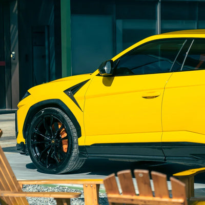 High Gloss Sunray Yellow Vinyl Wrap on Lamborghini Urus Rear Wheel