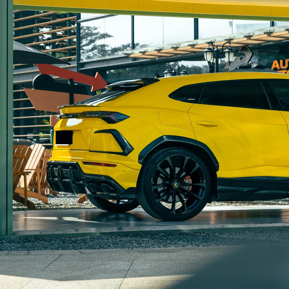 High Gloss Sunray Yellow Vinyl Wrap on Lamborghini Urus Front Full