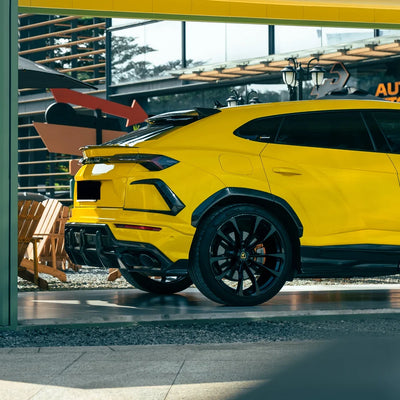High Gloss Sunray Yellow Vinyl Wrap on Lamborghini Urus Front Full