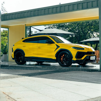 High Gloss Sunray Yellow Vinyl Wrap on Lamborghini Urus Side View