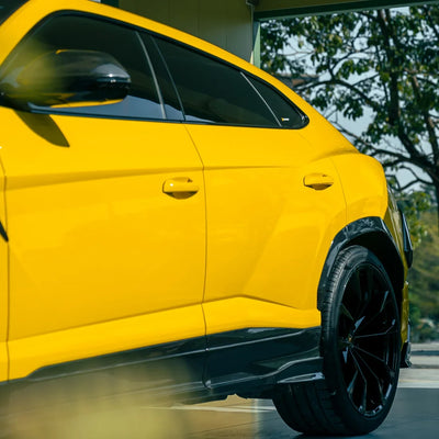 High Gloss Sunray Yellow Vinyl Wrap on Lamborghini Urus Side Angle