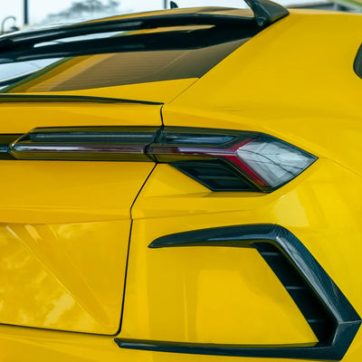 High Gloss Sunray Yellow Vinyl Wrap on Lamborghini Urus Headlight Close-Up