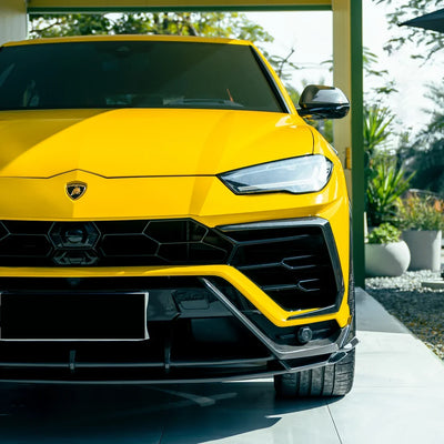 High Gloss Sunray Yellow Vinyl Wrap on Lamborghini Urus Front Close Up View