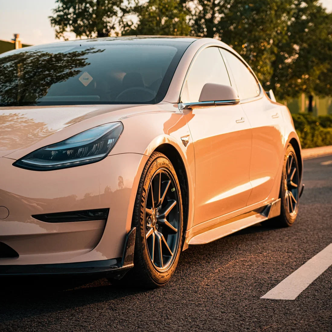 High Gloss Sahara Beige Vinyl Wrap on Tesla Front Angle View