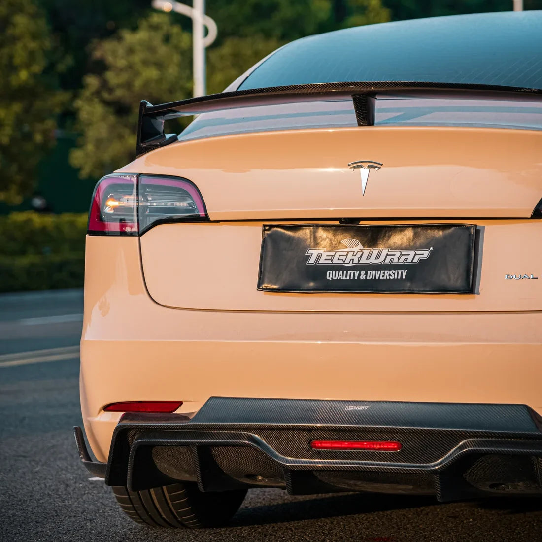 High Gloss Sahara Beige Vinyl Wrap on Tesla Rear View