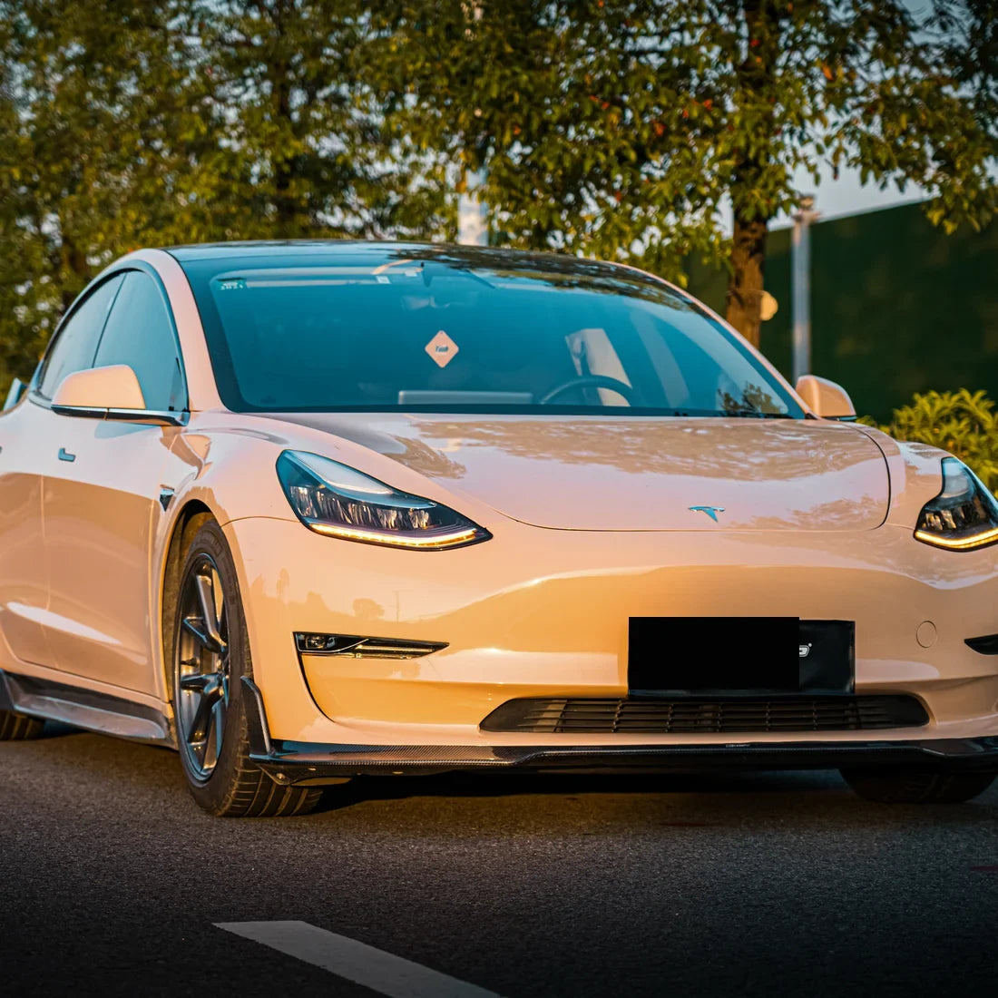 High Gloss Sahara Beige Vinyl Wrap on Tesla Side Profile View