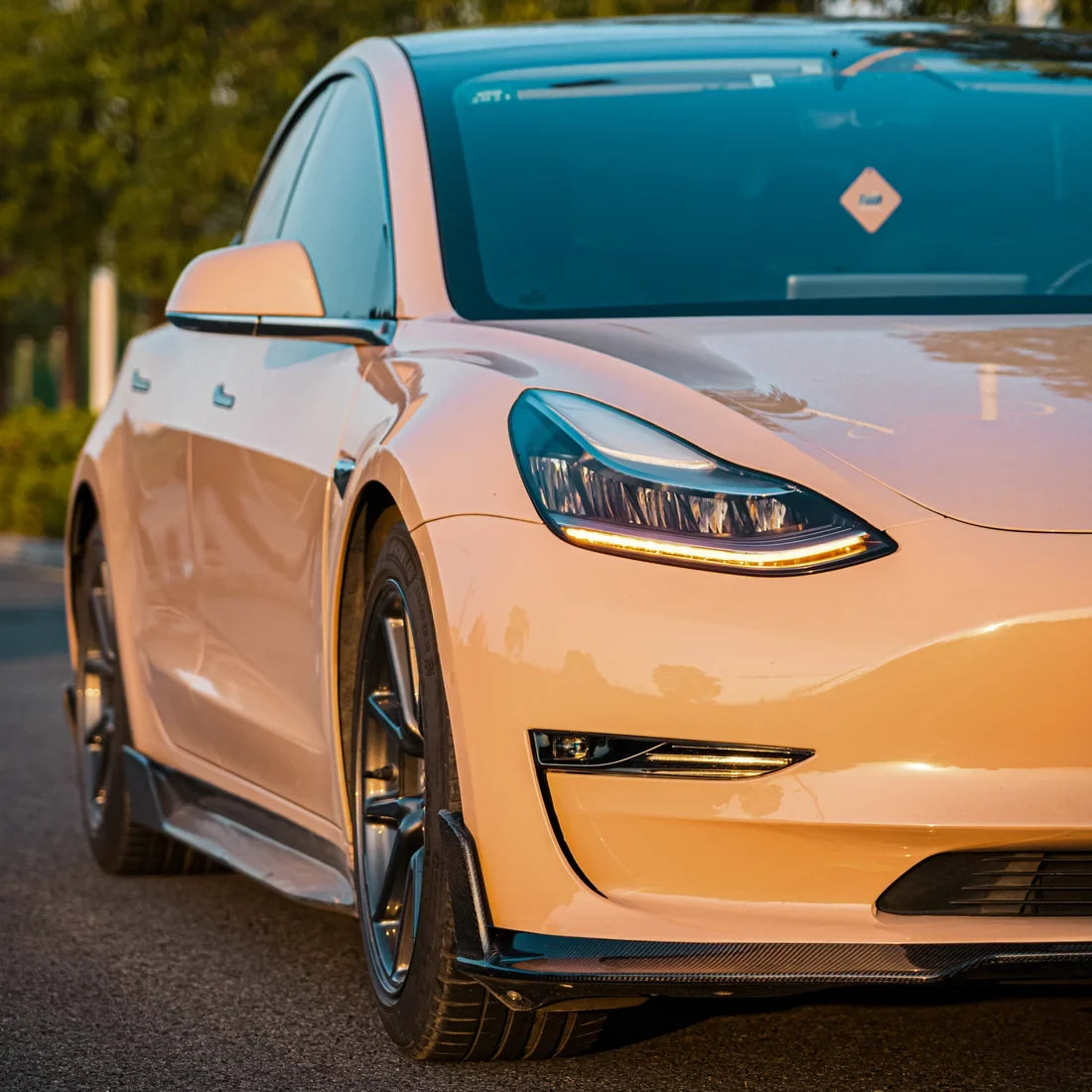 High Gloss Sahara Beige Vinyl Wrap on Tesla Front Side View