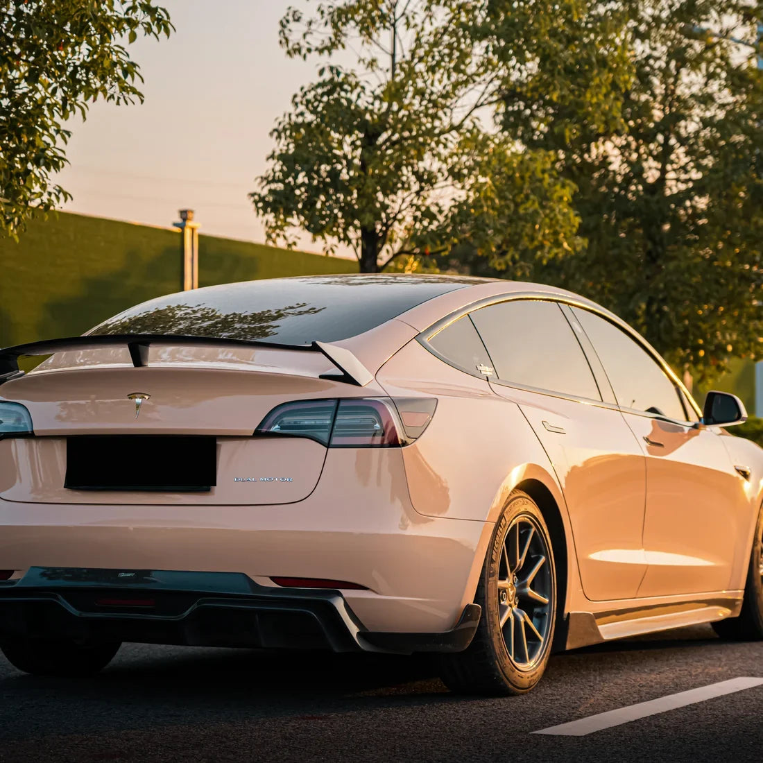 High Gloss Sahara Beige Vinyl Wrap on Tesla side view