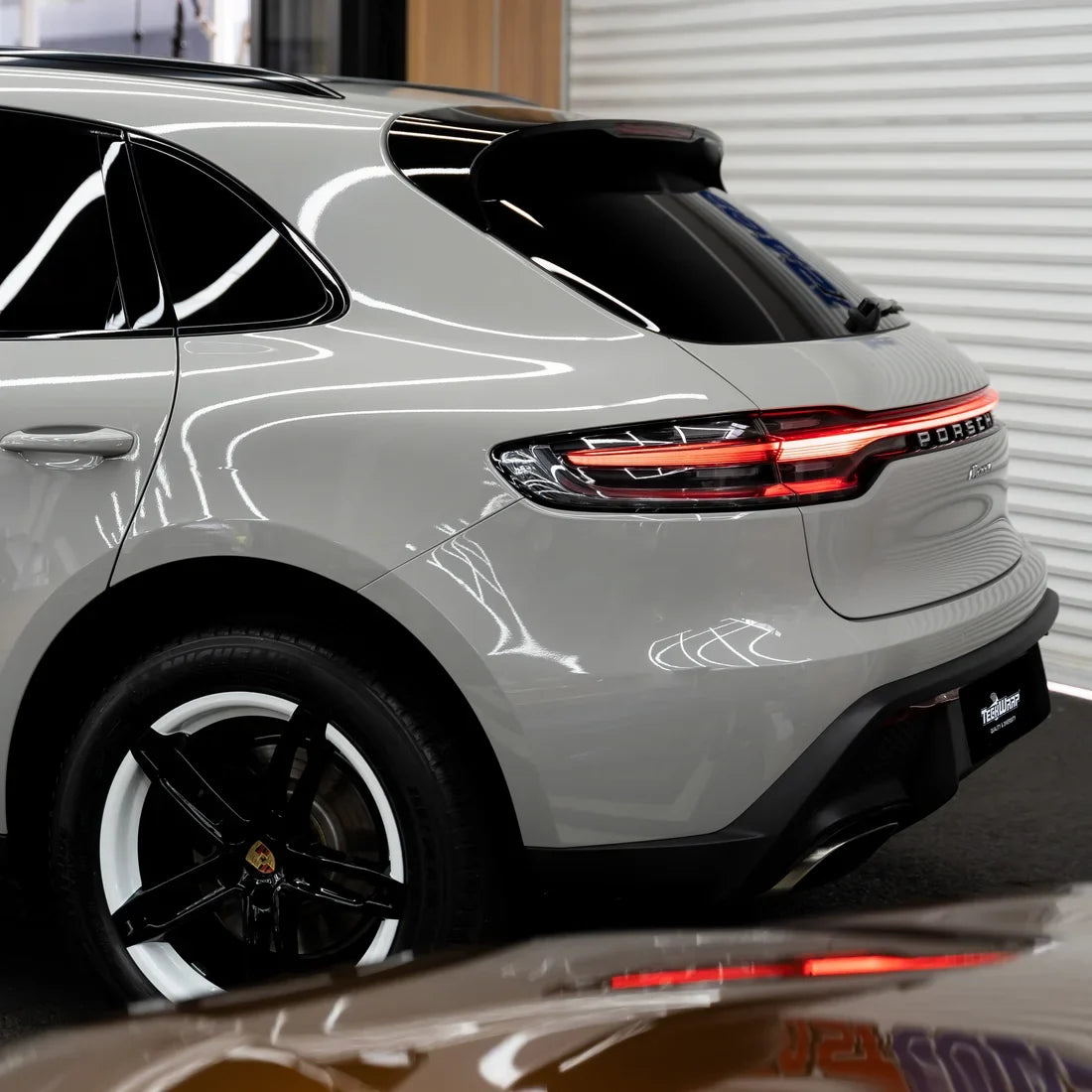 High Gloss Vintage Grey Vinyl Wrap on Porsche rear side