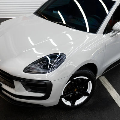Porsche featuring a High Gloss Vintage Grey Vinyl Wrap .