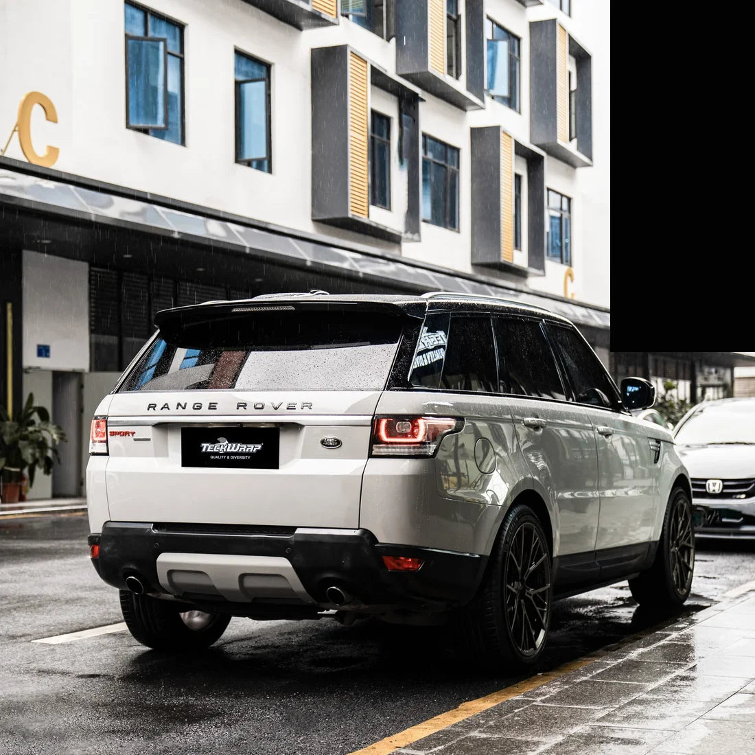 High Gloss Vintage Grey Vinyl Wrap on Range Rover side angle