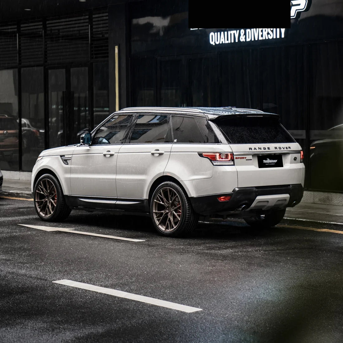 High Gloss Vintage Grey Vinyl Wrap on Range Rover rear side