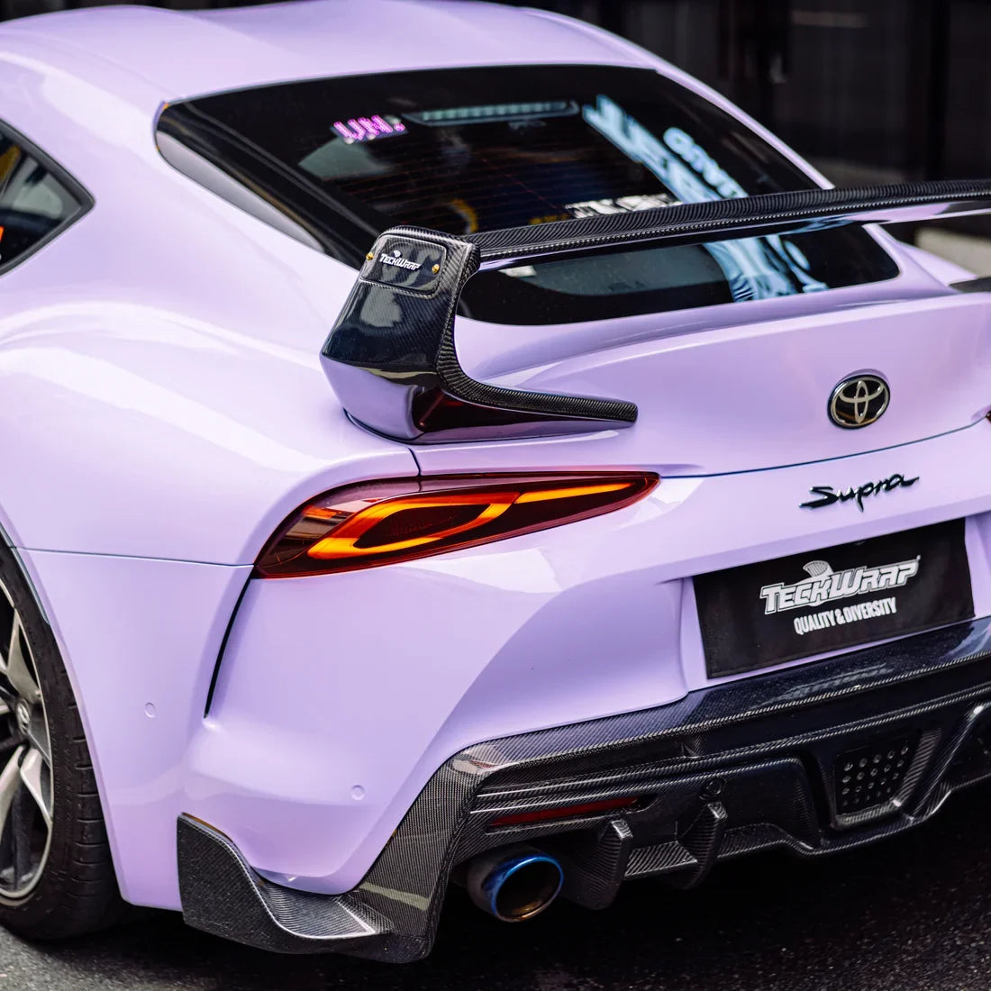 Toyota Supra in Spanish Lavender with a sleek solid high gloss vinyl finish.