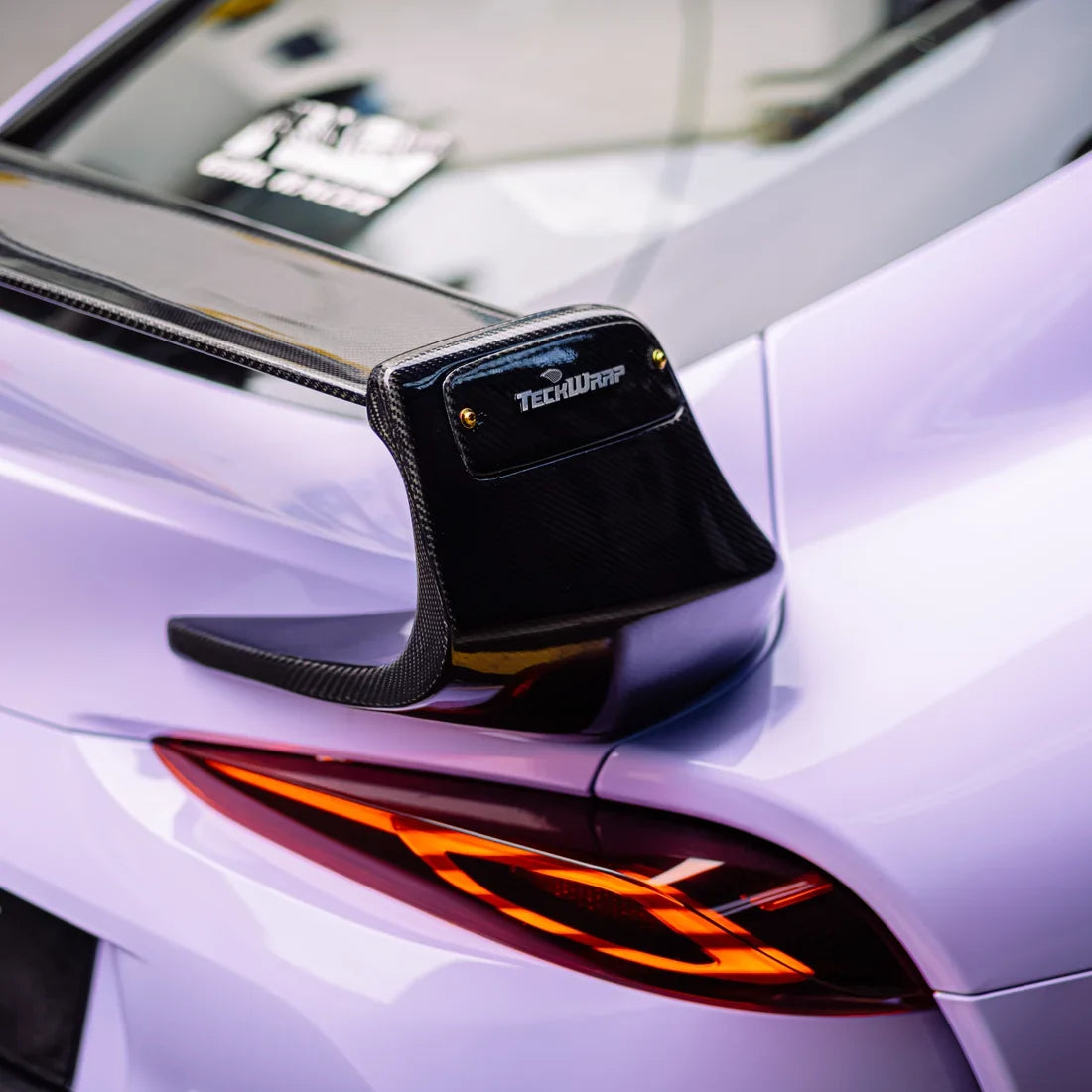 Toyota Supra in Spanish Lavender with a glossy high super gloss vinyl finish.