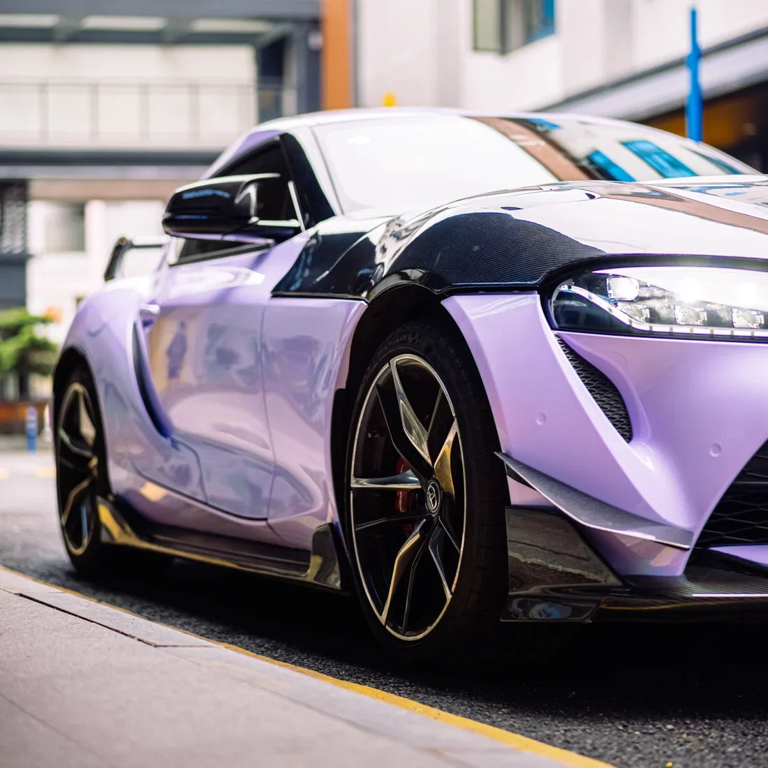 Toyota Supra showcasing a High Gloss Spanish Lavender Vinyl Wrap
