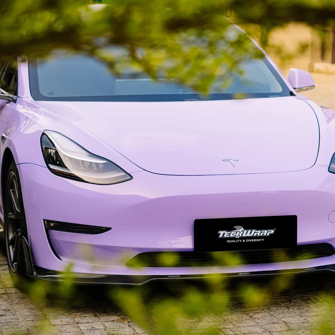 Tesla showcasing High Gloss Spanish Lavender Vinyl Wrap