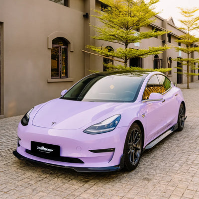 Tesla in Spanish Lavender with a sleek solid high gloss vinyl wrap.