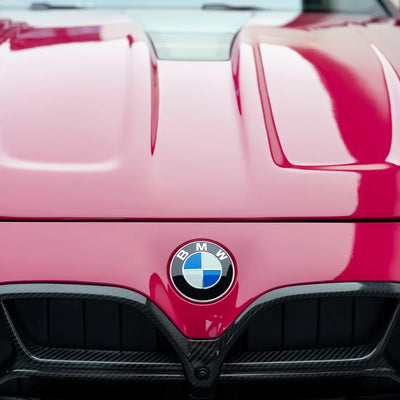 BMW displaying a High Gloss Berry Red Vinyl Wrap