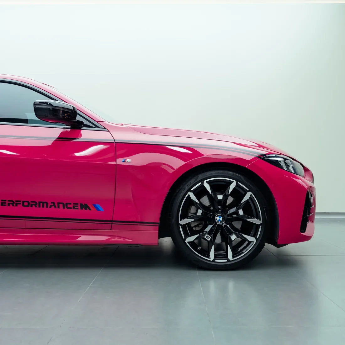 BMW showcasing a High Gloss Berry Red Vinyl Wrap