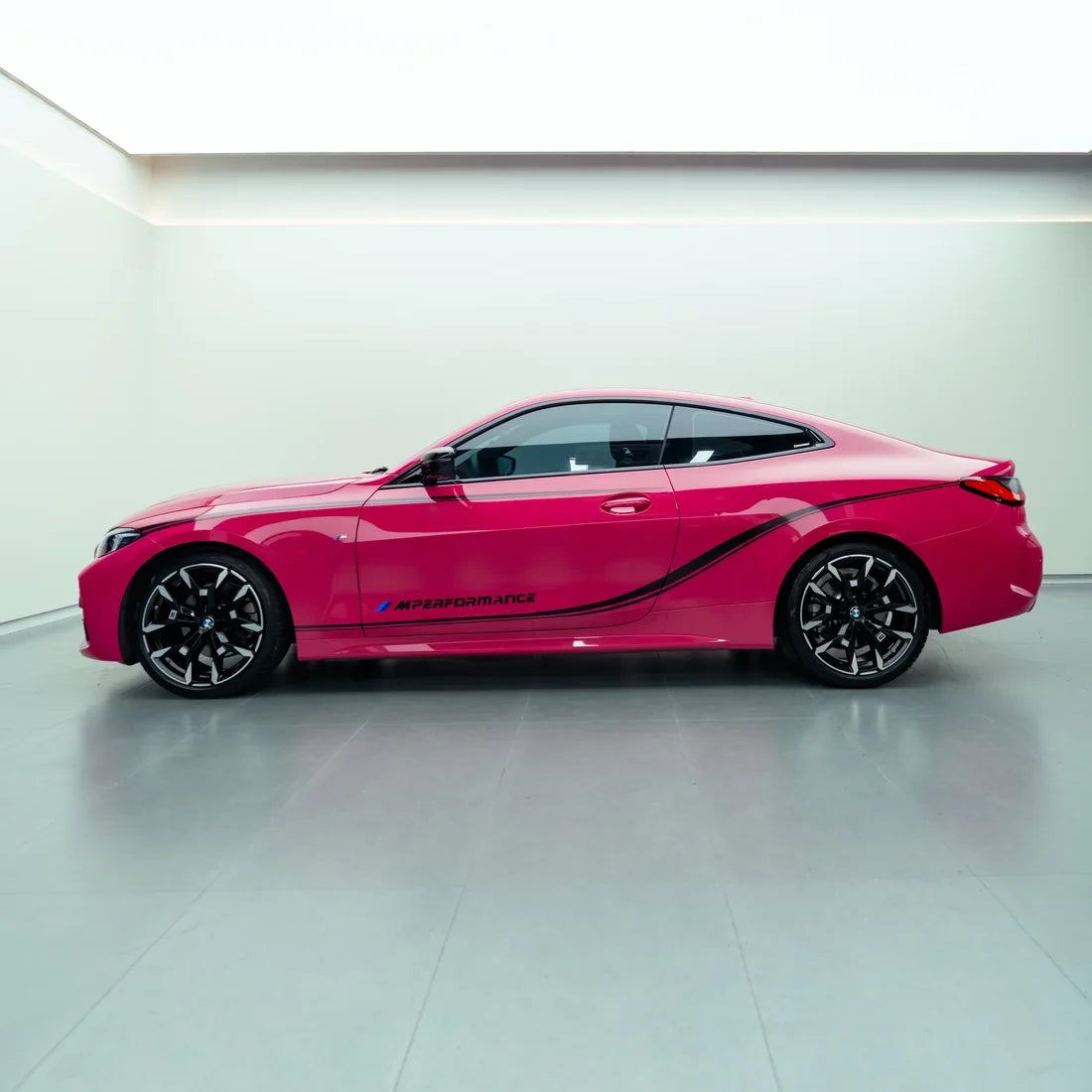 Porsche showcasing High Gloss Berry Red Vinyl Wrap