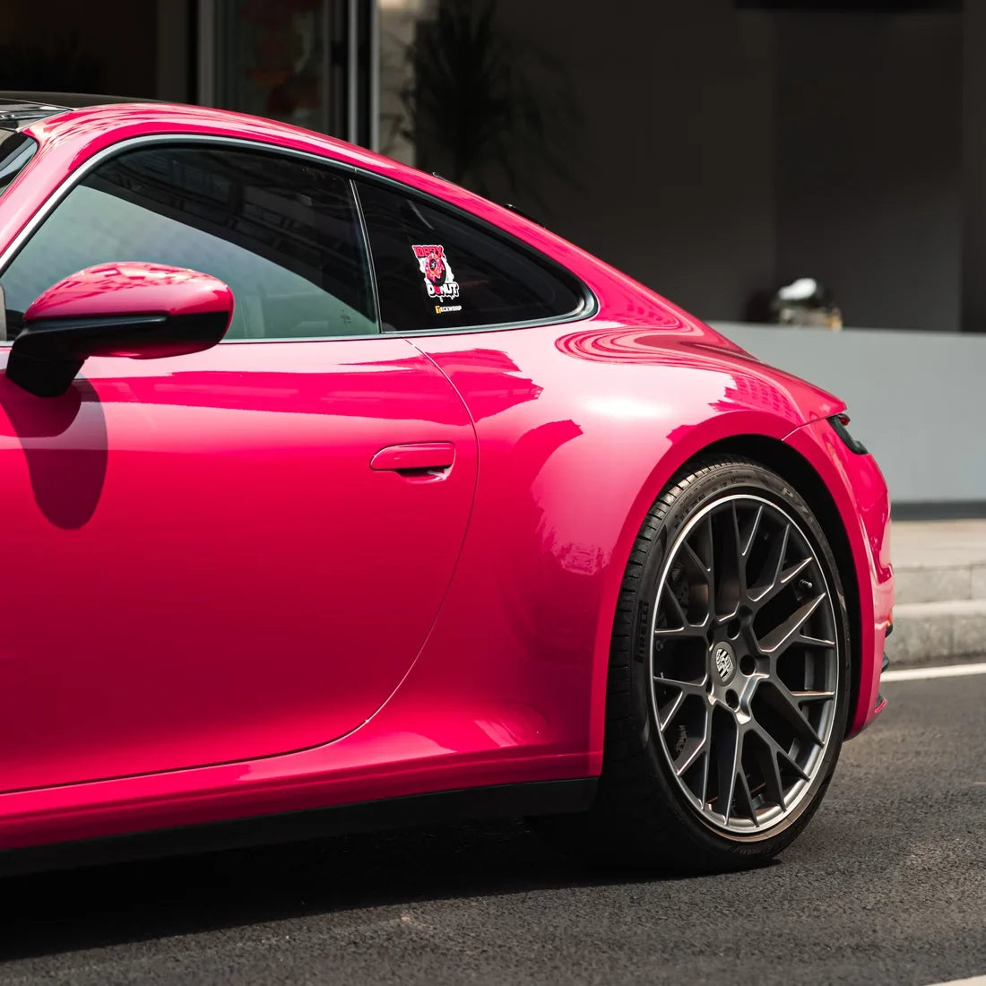 Porsche showcasing a High Gloss Berry Red Vinyl Wrap