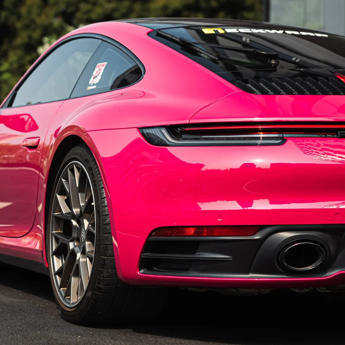 Porsche showcasing High Gloss Berry Red Vinyl Wrap