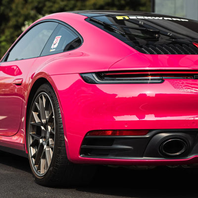 Porsche showcasing High Gloss Berry Red Vinyl Wrap