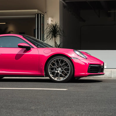 Porsche showcasing High Gloss Berry Red Vinyl Wrap Tyre