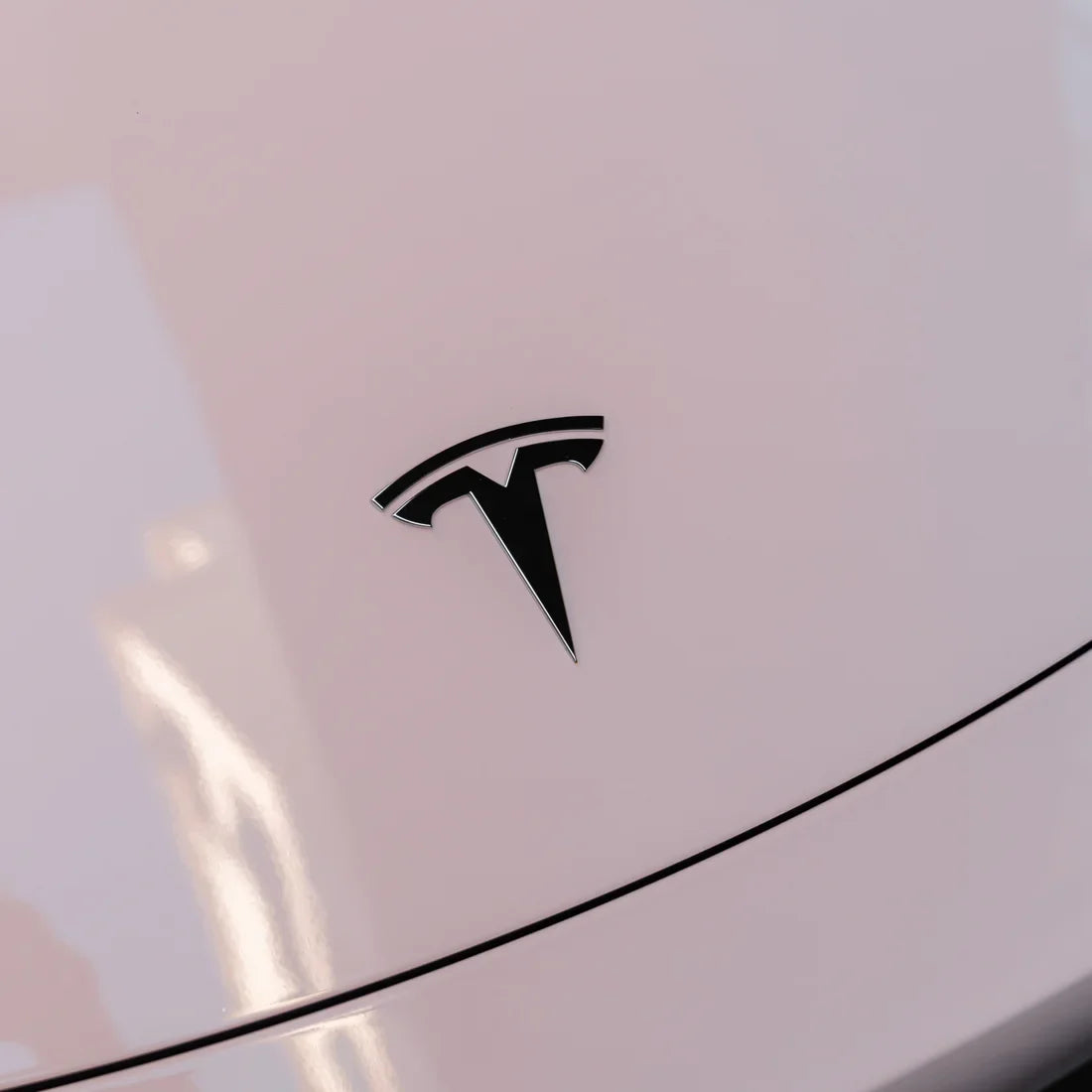 Tesla in High Gloss Strawberry Milk Vinyl Wrap