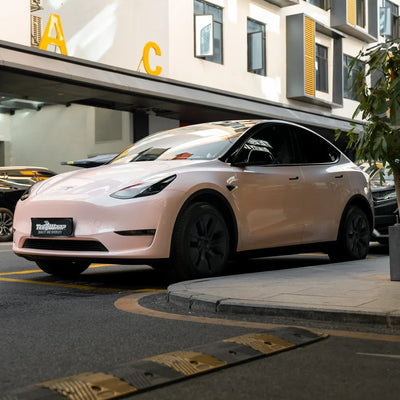 Tesla in High Gloss Strawberry Milk Vinyl Wrap