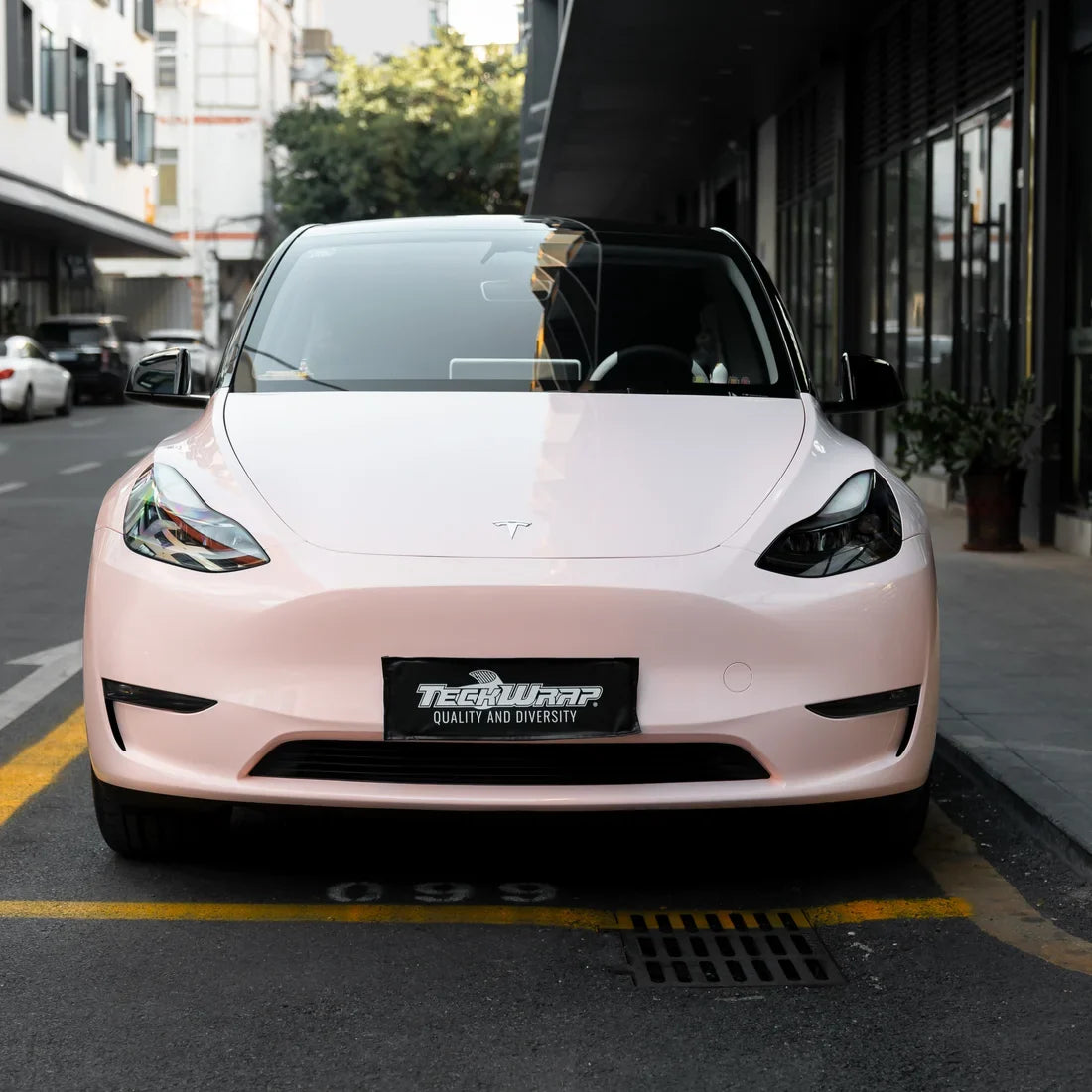 High Gloss Strawberry Milk Vinyl Wrap on Tesla