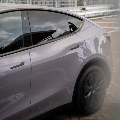 Tesla showcasing Wild Dove High Super Gloss Solid vinyl finish.