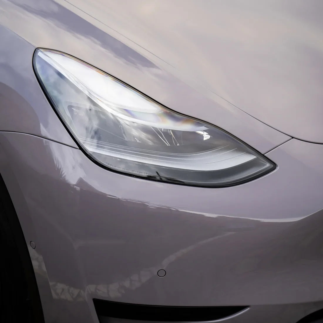 Tesla in High Gloss Wild Dove Vinyl Wrap.