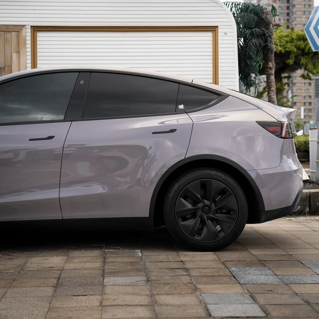 Tesla in High Gloss Wild Dove Vinyl Wrap.