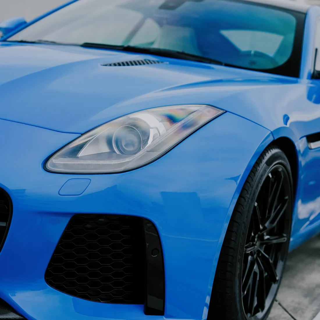 Jaguar in High Gloss Vibrant Blue Vinyl Wrap Side View