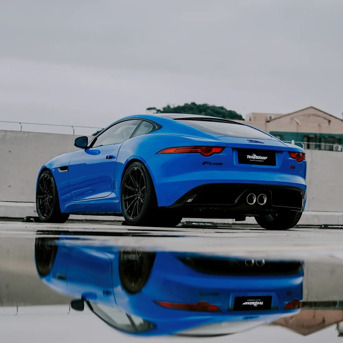 Jaguar showcasing High Gloss Vibrant Blue Vinyl Wrap