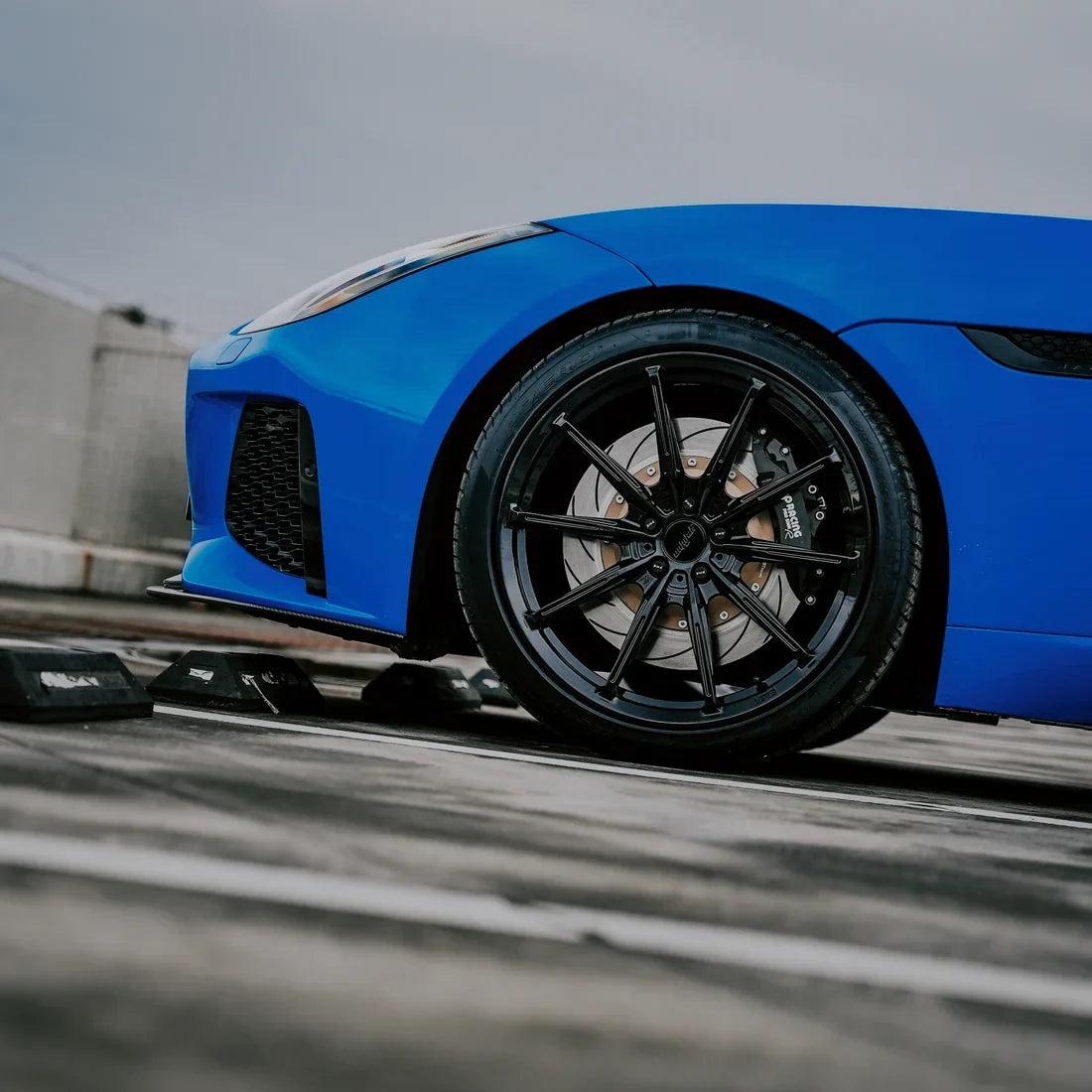 Jaguar with High Gloss Vibrant Blue Vinyl Wrap.
